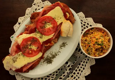Suprema Napolitana con guarnición.(Elije una guarnición sin precio).