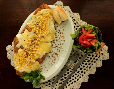 Milanesa Suiza con guarnición (Elige una guarnición sin precio).