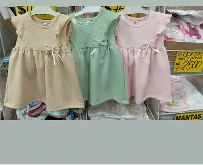 Vestidos con volado y moño del talle 1 al 4